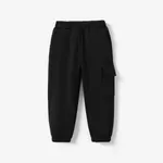 Pantalones casuales holgados para niño con bolsillo de parche - 1 pieza, mezcla de poliéster y spandex, color sólido Negro