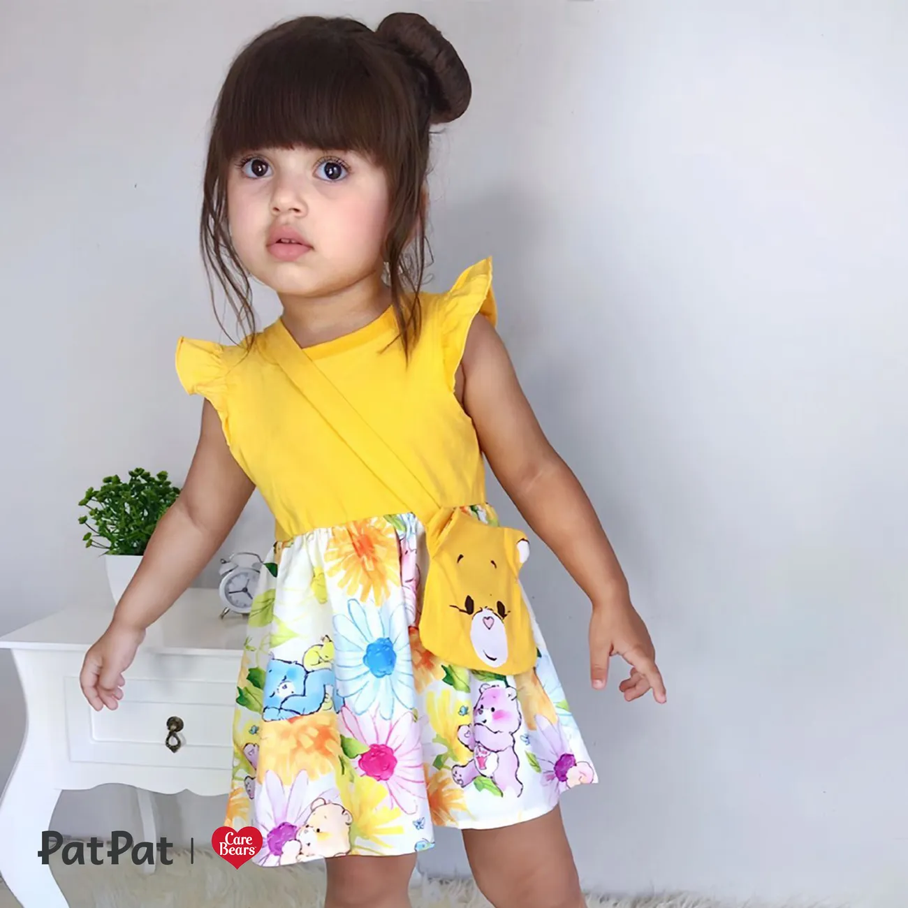Care Bears 2pcs Baby Girl Solid & Print Spliced Flutter-sleeve Dress with Crossbody Bag Set Yellow big image 1