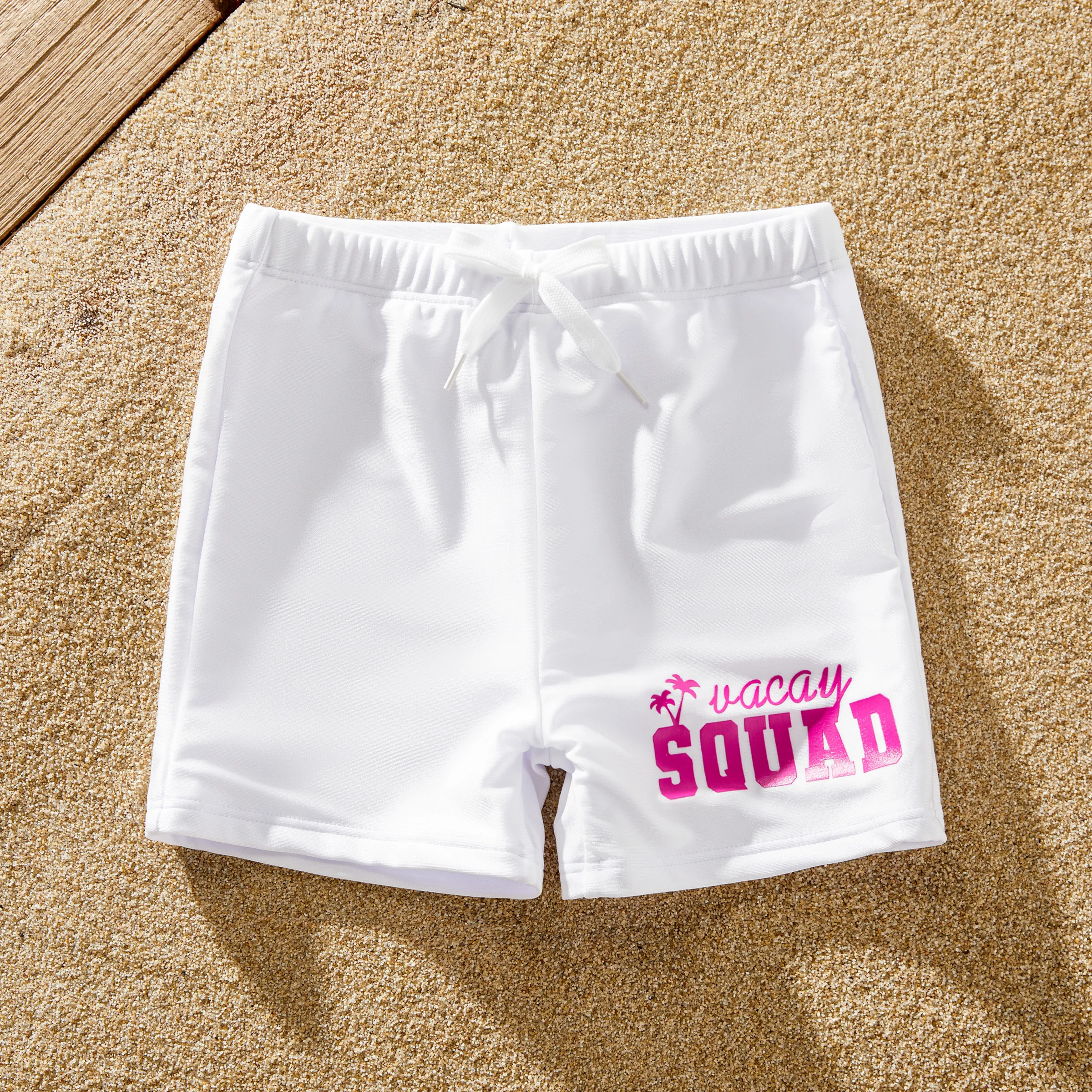 

Family Matching White Drawstring Swim Trunks or Sparkling Hot Pink One-Piece Swimsuit