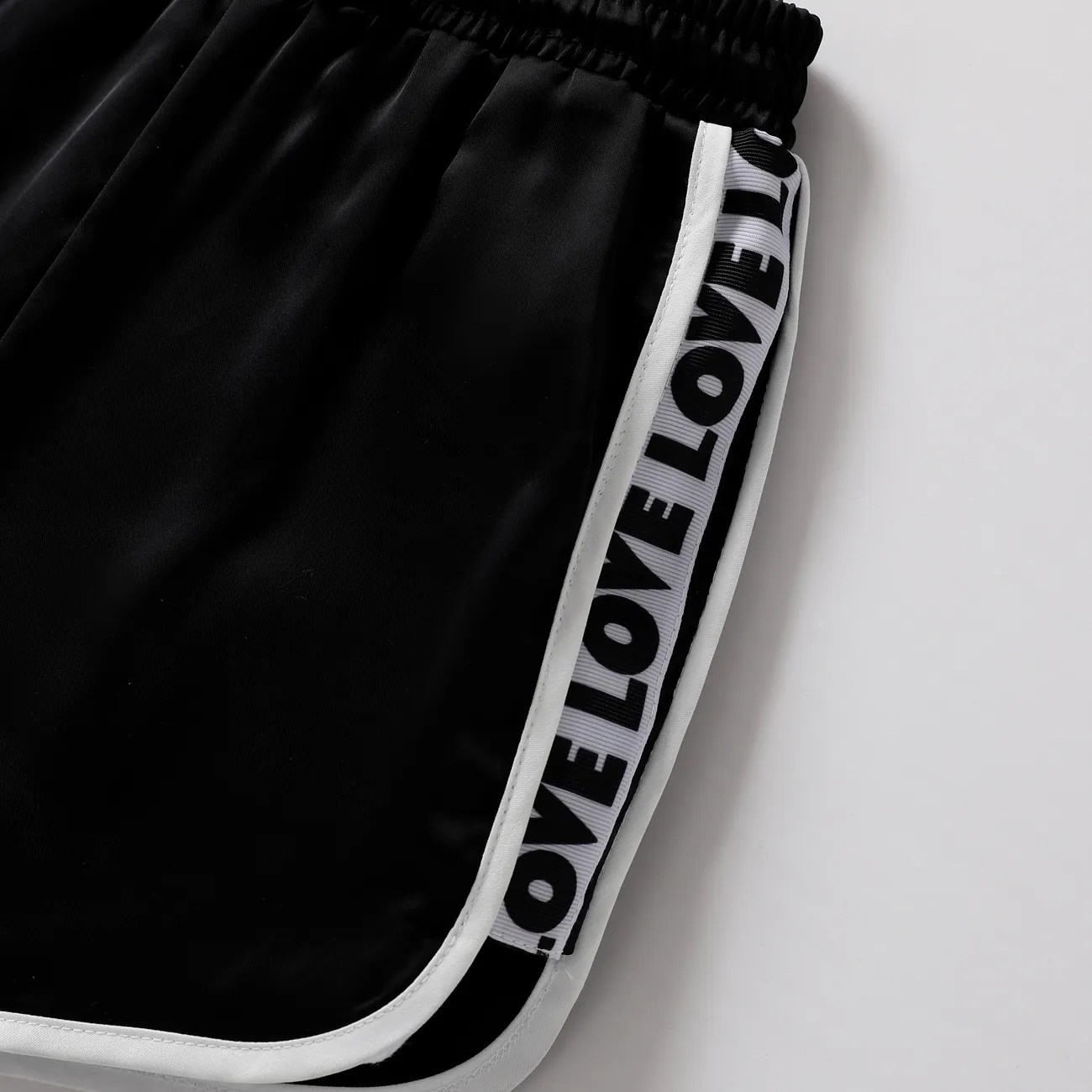 Pantalones casuales unisex de poliéster sólido con detalle de trenza, juego de 1 pieza Negro big image 1