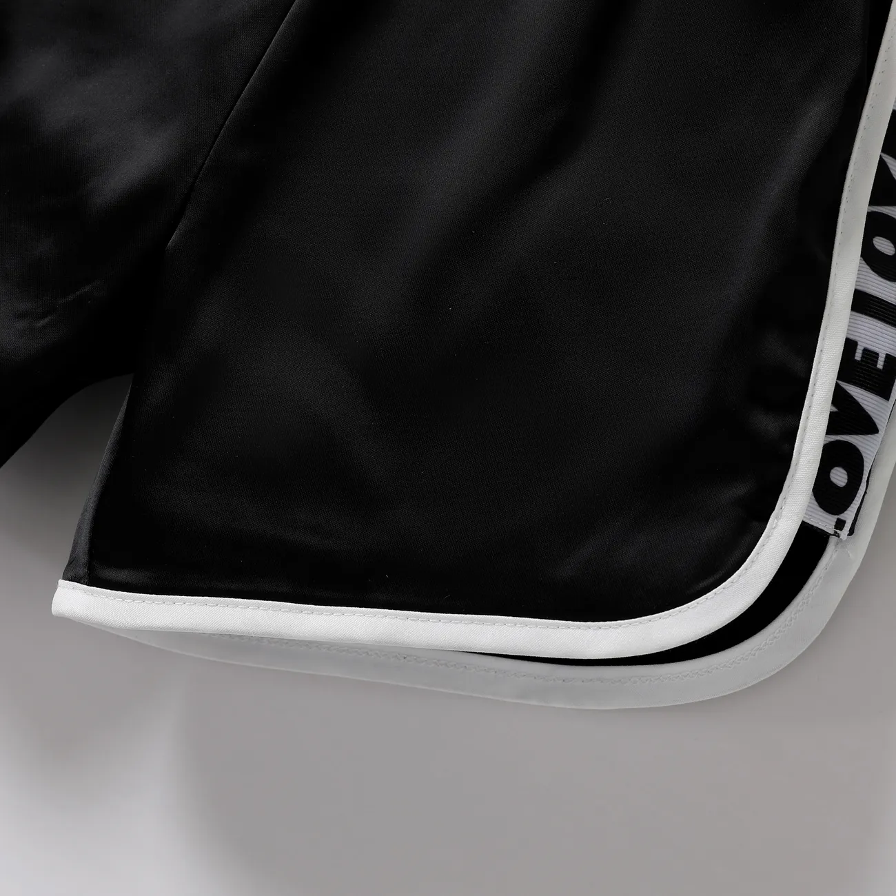 Pantalones casuales unisex de poliéster sólido con detalle de trenza, juego de 1 pieza Negro big image 1