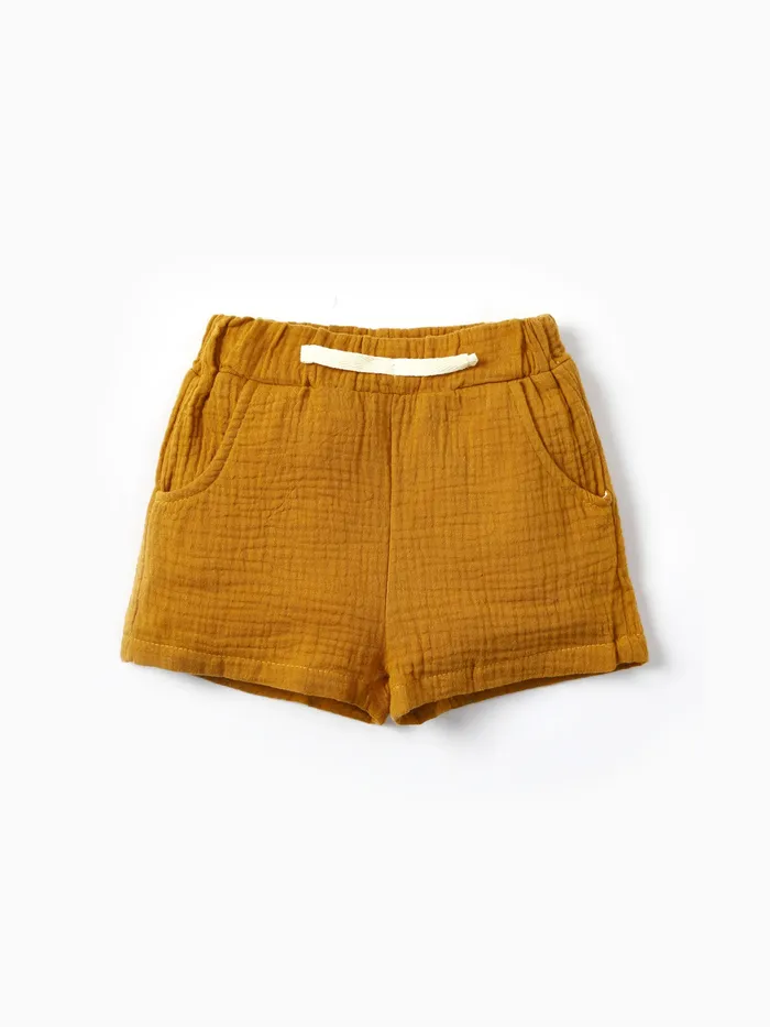 Pantalones cortos casuales de color sólido de algodón para bebé niño