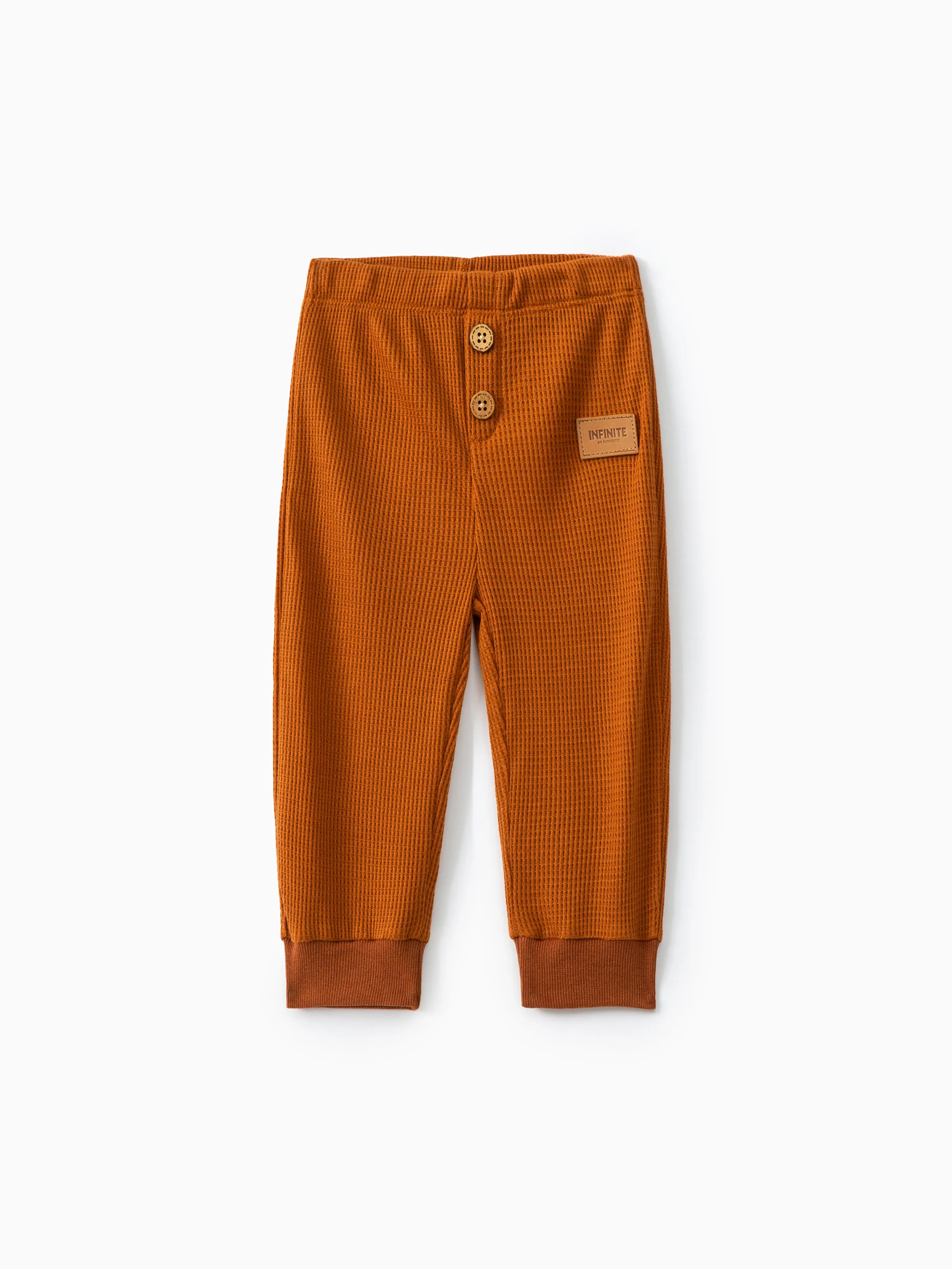 Pantalones waffle lisos con detalle de parche de letra para bebé niño/niña