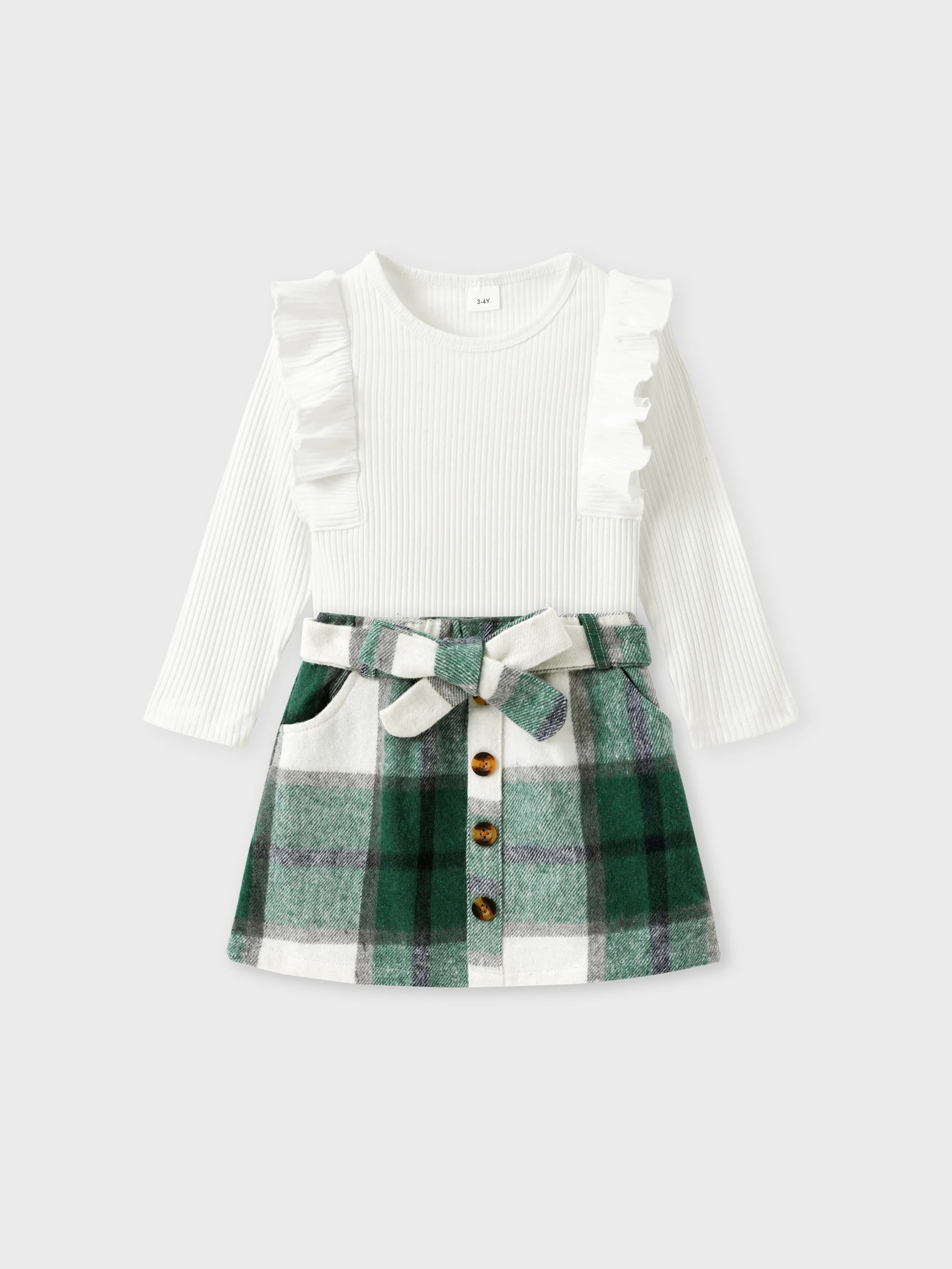 

2pcs Toddler Girl Trendy Ruffled Ribbed Long-sleeve Tee and Plaid Button Design Skirt Set