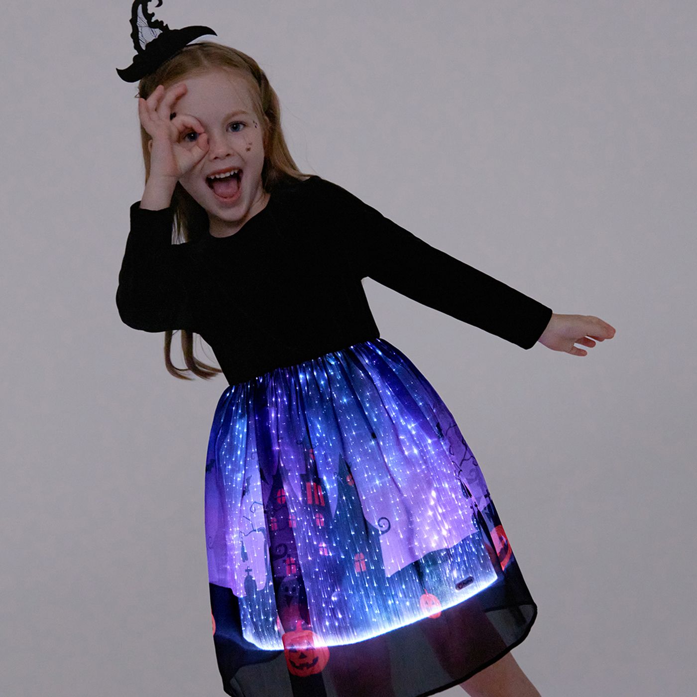 

Go-Glow Halloween Illuminating Kid Dress with Light Up Halloween Print Skirt Including Controller (Built-In Battery)