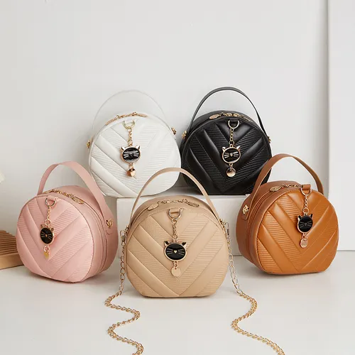 Toddler/kids The small round bag can be worn cross-body on one shoulder