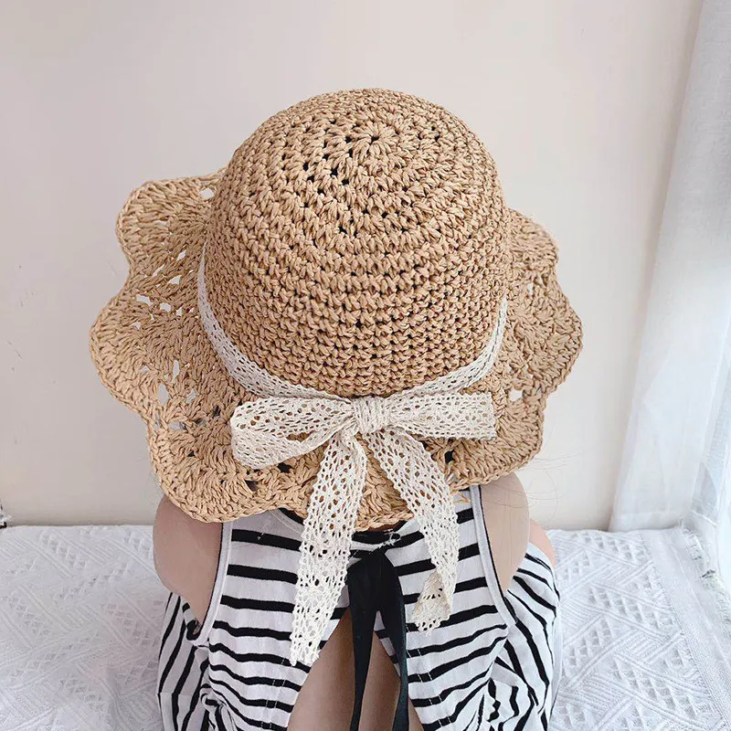 Sombrero de paja de playa lindo dulce para bebé/niña pequeña con estilo de cinta de satén al azar Beige big image 1