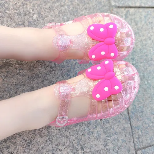 Sandalias de hebilla semitransparente con apliques de lazo de moda para niños pequeños / niñas