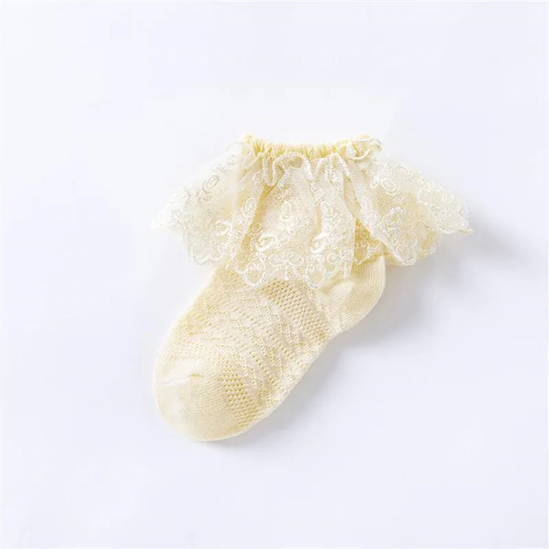 Calcetines de malla de borde de encaje de color sólido de estilo dulce para bebé / niño pequeño Amarillo