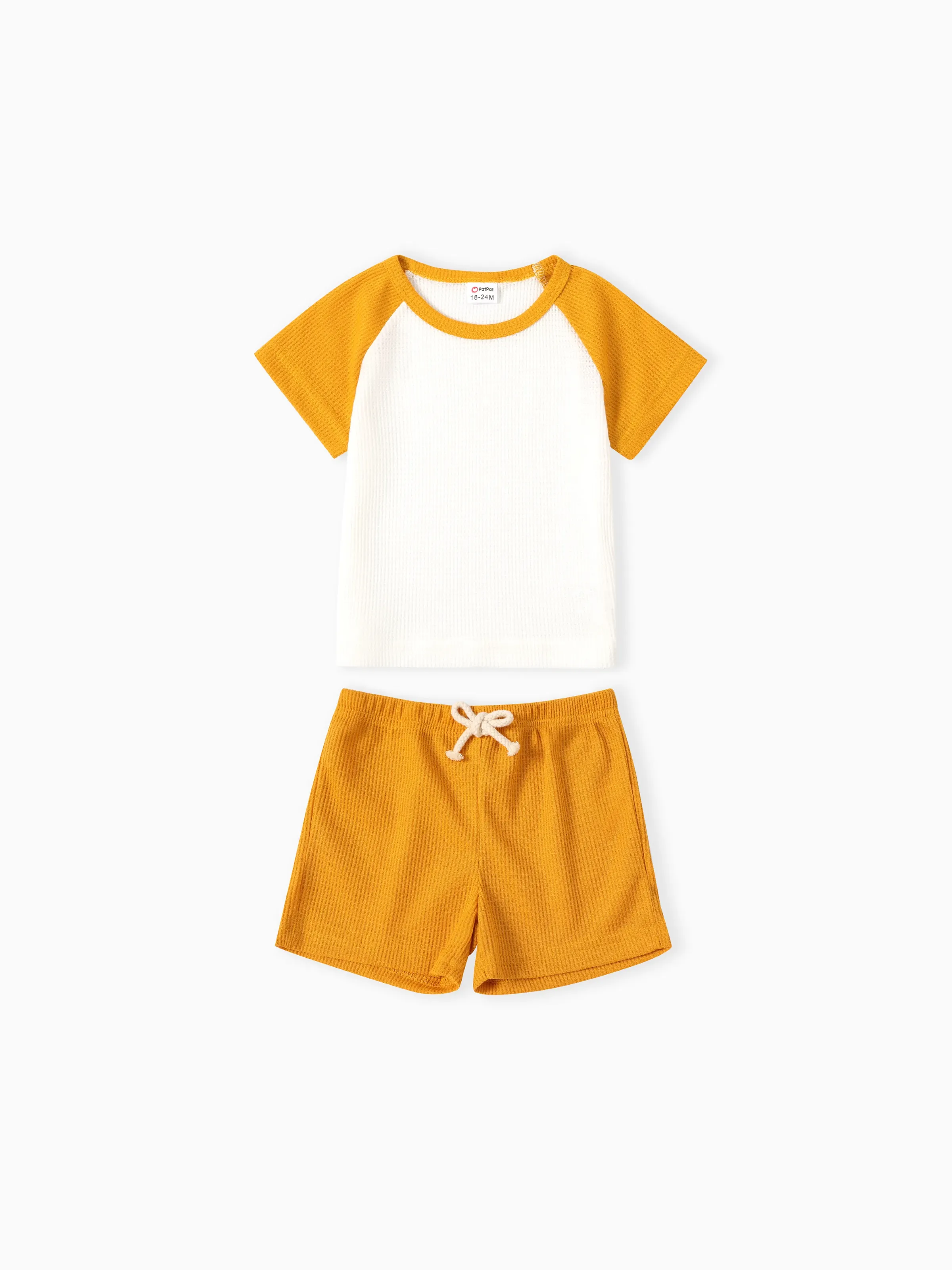 

2-piece Toddler Boy Waffle Colorblock Raglan Sleeve Tee and Solid Color Shorts Set